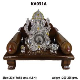 Maharaja Ganesha idol with accessories and base.