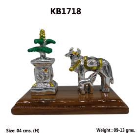 COW AND CALF WITH PLANT